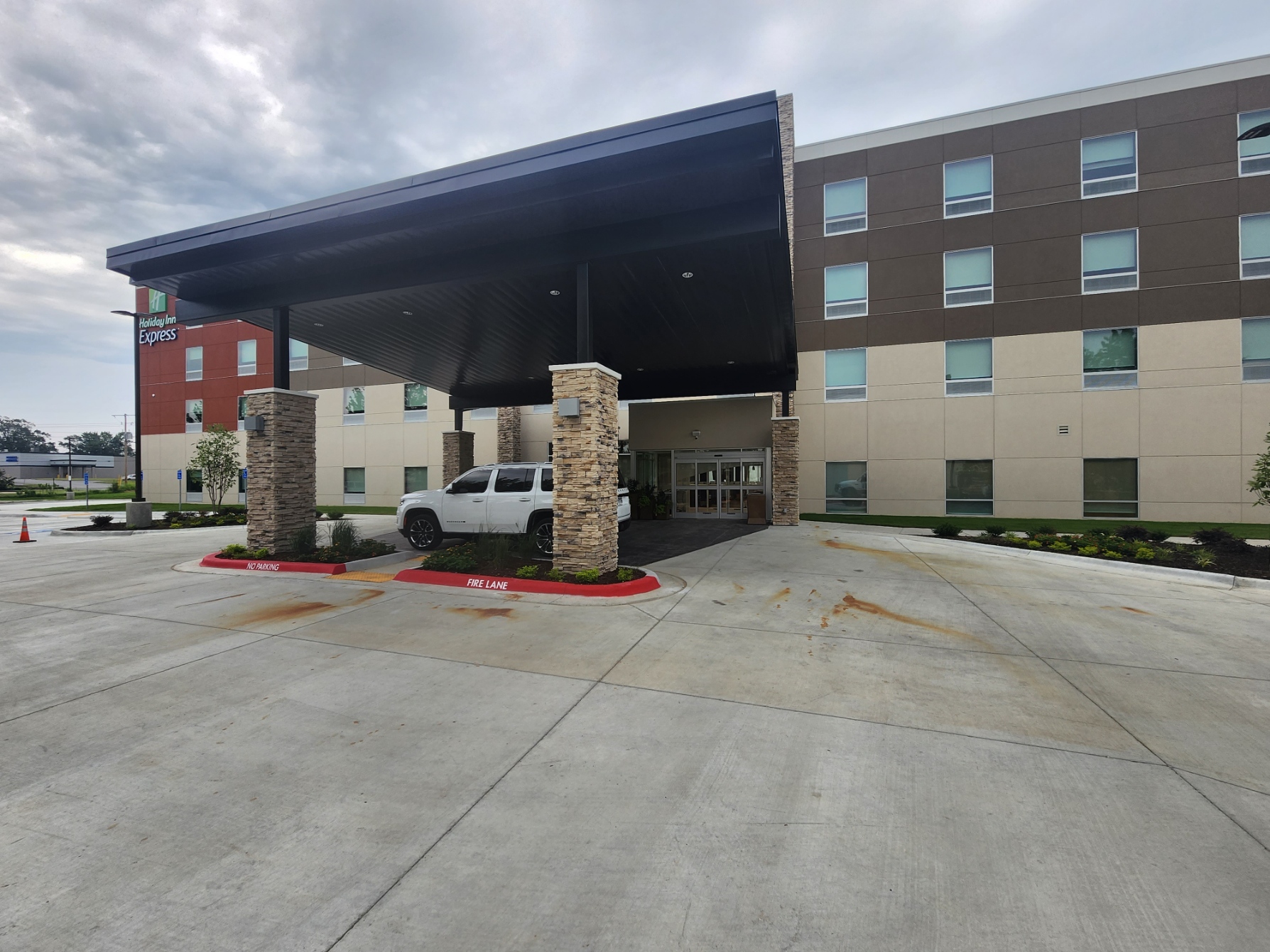 Commercial Property Concrete Cleaning Services at Holiday Inn Express